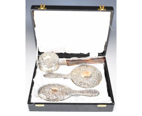 Cased Elizabeth II hallmarked silver dressing table set comprising hand mirror, brush and comb, Birmingham 1978/9, maker&nbsp