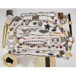 A collection of costume and other jewellery including silver charm bracelet, gold plated watches,