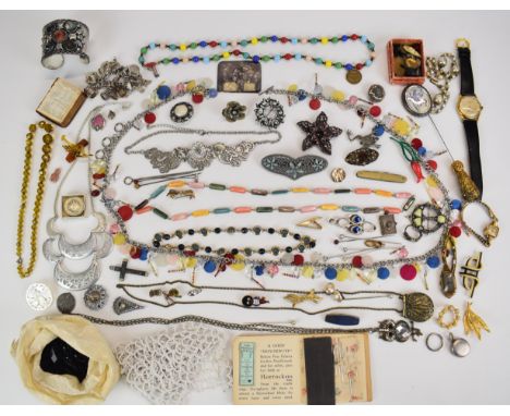 A collection of costume and other jewellery including silver charm bracelet, gold plated watches, beads, shell necklace, jet 