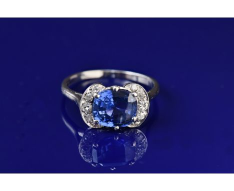 Art Deco platinum ring set with a cushion cut natural untreated Ceylon sapphire of approximately 3.2ct and five diamonds to e