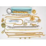 A collection of costume jewellery including Sphinx brooch, Jewelcraft bracelet, Sarah Coventry,