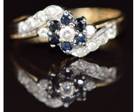 A 9ct gold ring set with sapphires and cubic zirconia, 2.5g, size O