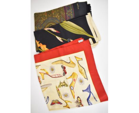 Two Salvatore Ferragamo silk scarves, each approximately 90x90cm, and a gentleman's paisley scarf by Rochas