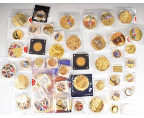 A collection of military and aircraft related gold plated picture coins including oversized 70mm examples  