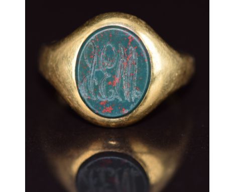 An 18ct gold signet ring set with blood stone, maker C G &amp; S, 7.4g, size J