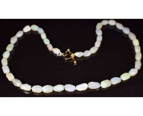 A necklace made up of 42 barrel shaped opal beads, 21.5g, 45cm