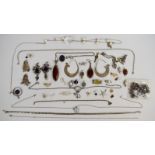 A collection of mainly silver jewellery including Greek key necklace, five clasps, bracelet,