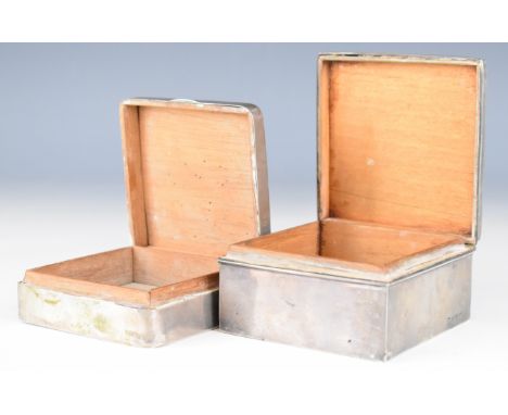 Two hallmarked silver cigarette boxes, one with engine turned decoration to lid, Birmingham 1923, maker&nbsp;Adie Brothers Lt