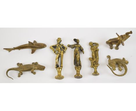 Three 19thC brass figural pipe tampers and four novelty brass animals including a finely cast lizard / komodo dragon, tallest