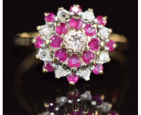 A 9ct gold ring set with diamonds and rubies in a cluster, 2.2g, size P