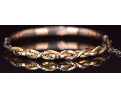 A 9ct rose gold plaited bangle, 8.6g, 5.5 x 5.8cm&nbsp;