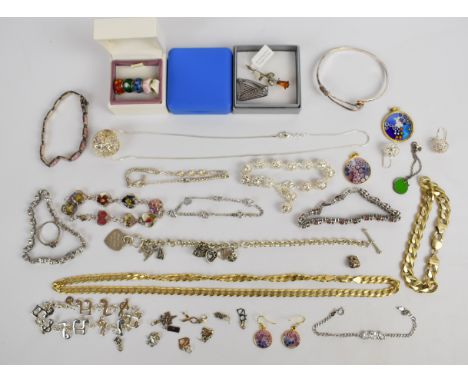 A collection of silver including gilt curb link necklace and bracelet, ten bracelets, bangle, Pandora style beads, six charms