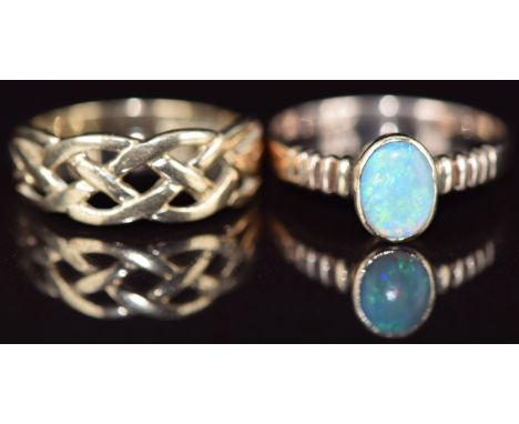 Two 9ct gold rings, one in a Celtic design the other set with an opal, 4.3g, sizes O &amp; Q