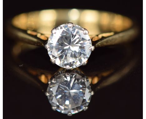 An 18ct gold ring set with a round cut diamond of approximately 0.85ct, 2.5g, size K