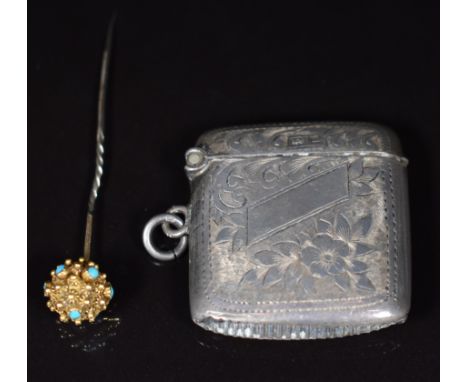 A yellow metal stick pin set with turquoise cabochons, with hinged top opening to reveal a locket compartment, and a hallmark