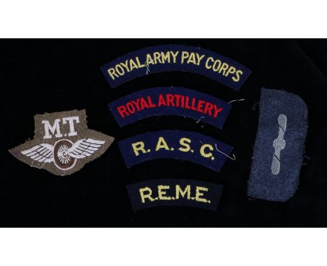 Second World War British Motor Transport trade badge and RAF Leading Aircraftsman rank badge together with post war/reproduct