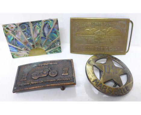 Four belt buckles; one Mexican silver and abalone, Harley-Davidson, Colorado State Penitentiary and US Marshall 