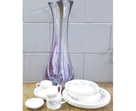 A collection of Wedgwood Angela pattern teawares including cups, plates, saucers and bowls and a large glass vase 