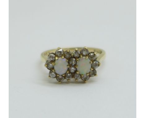 A 9ct gold, white stone and opal double cluster ring, 3.3g, R 