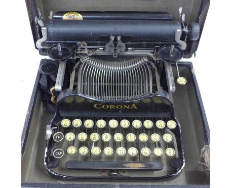 A portable folding Corona typewriter 