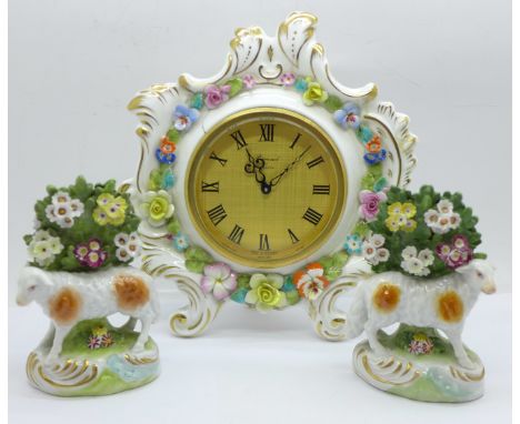 A small pair of porcelain figures of sheep and flowers, a/f and a Coalport ceramic clock, case cracked 