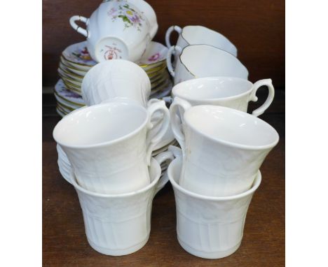 Six Royal Crown Derby Derby Posies cups and saucers and a Royal Doulton St. Moritz part coffee set 