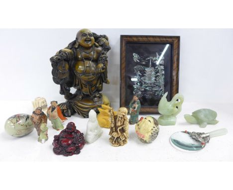 A collection of figures including a rabbit netsuke, other netsuke, a Chinese magnifying glass with jade handle, other figures