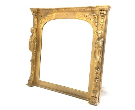 Large 20th century gilt framed pier mirror, the arched mirrored plate enclosed by floral, scrolled and figural corbels, 135cm