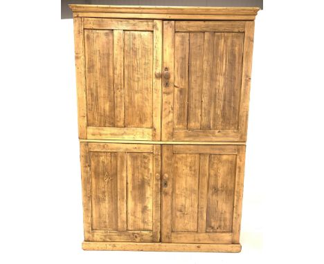 Victorian style pine kitchen press, top section fitted with two panelled doors enclosing two shelves, two doors under enclosi