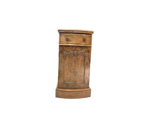 Victorian figured walnut bow front pedestal bedside cupboard, fitted with one drawer over cupboard door enclosing one shelf, 