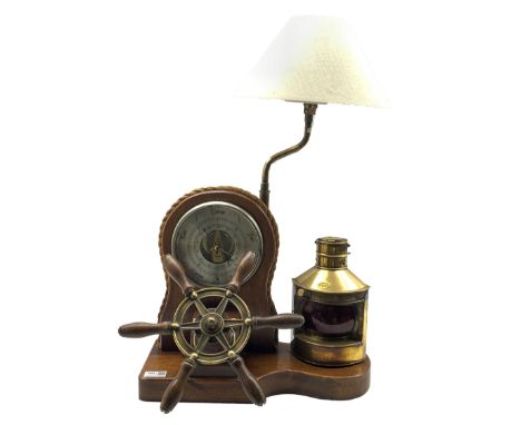 Nautical themed table top lamp and aneroid barometer, the oak case with novelty ships wheel and gas lamp, W42cm