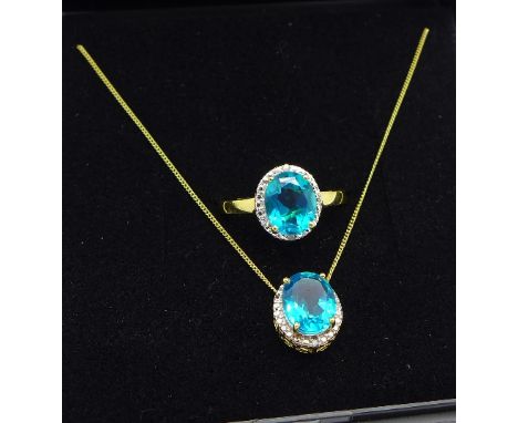 A blue quartz and diamond ring and matching pendant with chain, R