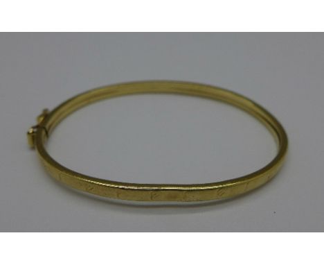 A 9ct gold baby bangle, 2.2g