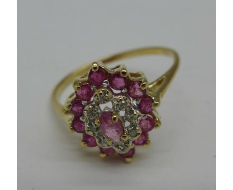 A 9ct gold, ruby and diamond cluster ring, 2.4g, R