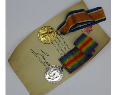 A pair of WWI medals to 2032 Pte. T. Wilson R. Highrs with two certificates and delivery tube