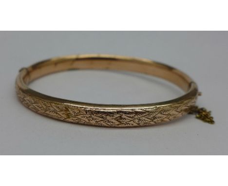 A 9ct gold bangle, 17.7g