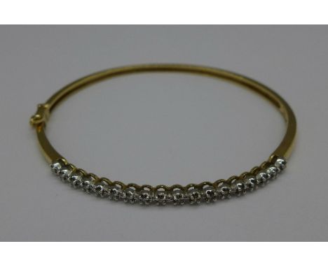 A 14ct gold bangle, 9.3g