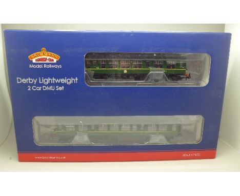 A Bachmann Branch Line Derby Lightweight Two Car DMU in BR green with yellow warning panel, boxed