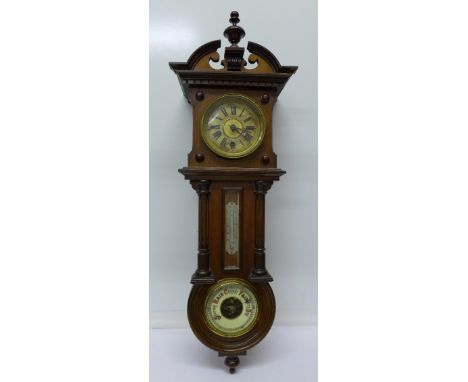 A walnut cased combination clock, barometer and thermometer