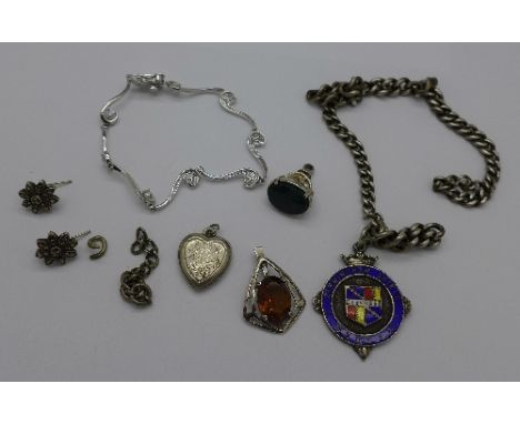 Silver jewellery and a silver chain with fob