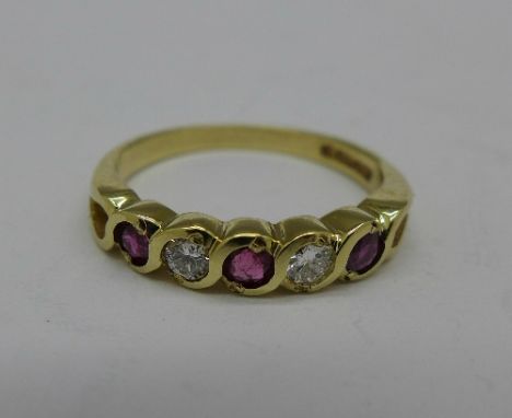 A 9ct gold, ruby and diamond five stone ring, 2.3g, N