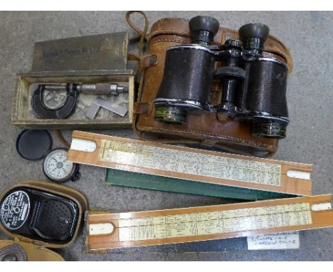 A pair of Lawrence & Mayo Prismatic binoculars, cased, two slide rules, light meter, micrometer, etc.
