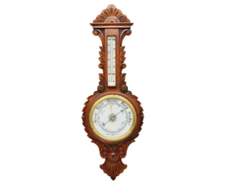 A Victorian carved oak aneroid wheel barometer, with white glass dial and separate thermometer, 88cm