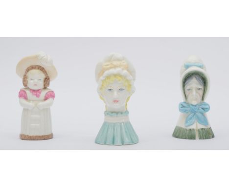 Royal Worcester, a fine bone china candle snuffer, dated 1976, named Feathered Hat, 9cm, another Mop Cap and a third Old Woma