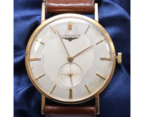 A Longines, 9ct gold manual wind Gentleman's wristwatch, London 1960, the silvered dial with baton markings and subsidiary se