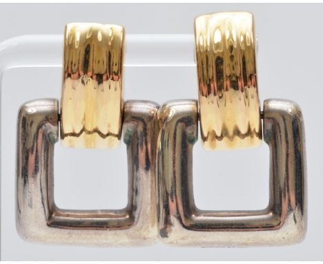 Bayanihan, a 14K gold and silver pair of Modernist ear rings, signed, 35 x 22mm, 11gm. The Bayanihan company was started by W