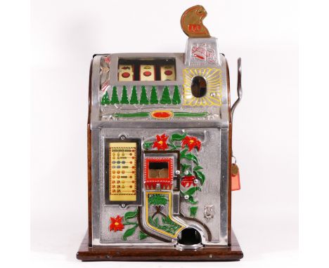 A Mills Poinsettia slot machine, one arm bandit, c.1929, restored and working on a 1D coin, wooden case with cast metal cabin