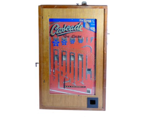 A Cascade De Luxe by Bell Fruit Manufacturing penny drop case slot machine, mahogany cabinet, serial number B1243, type GA1, 