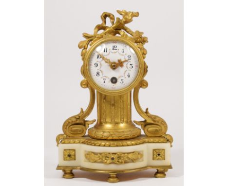 A French 19th century ormolu and white onyx mantel time piece, white enamel dial with floral garland, ornate floral case, uns