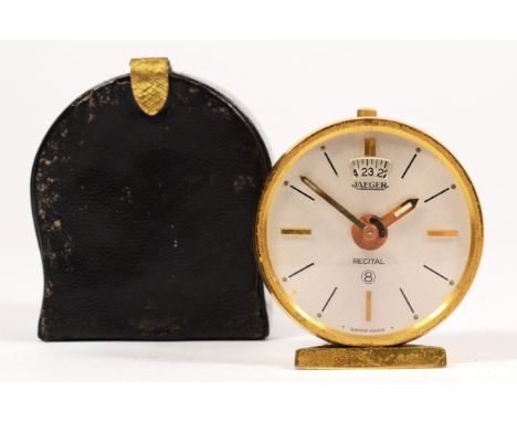 A Jaeger, eight day brass alarm clock, c.1960's, with textured body, diameter 4.5cm, case.